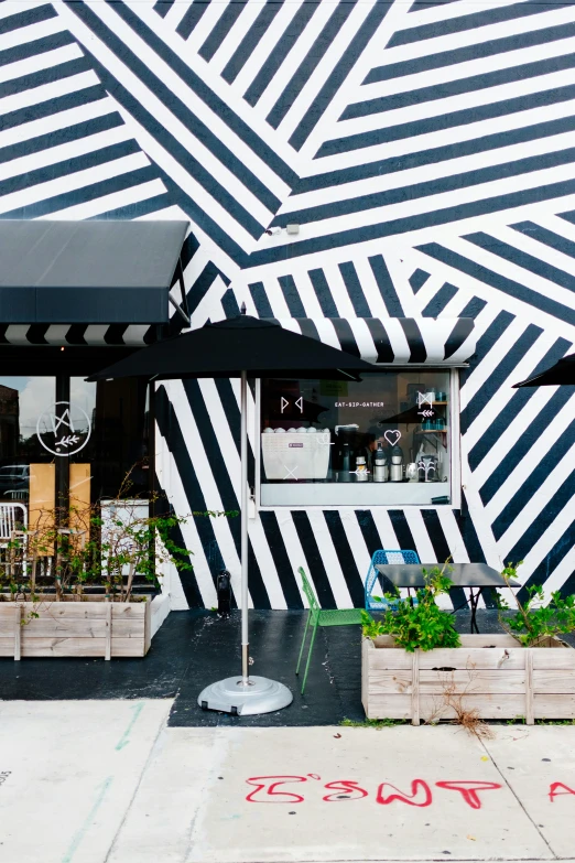 this is an artistic restaurant with a striped wall