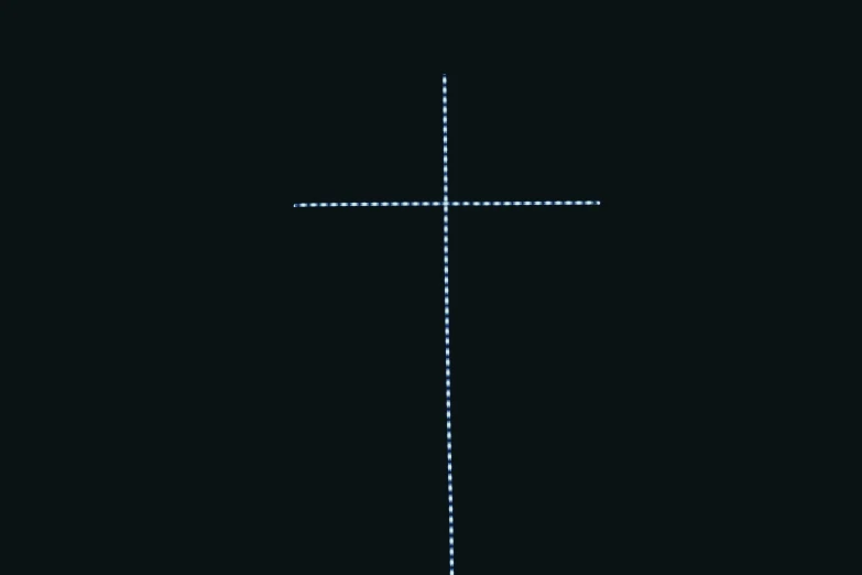 a cross that is in the dark