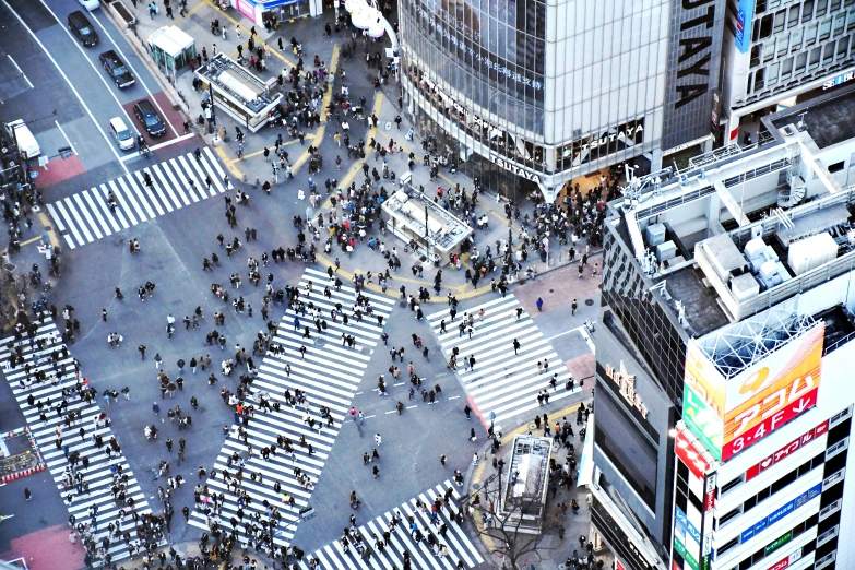 a large group of people on a city street