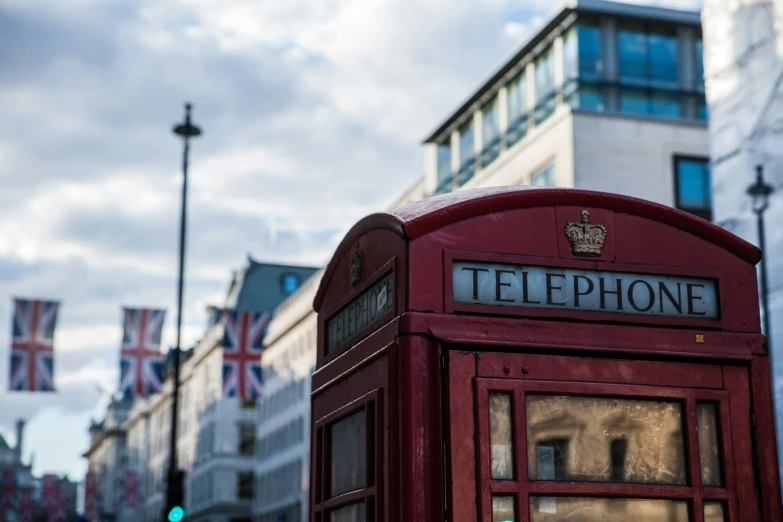 a telephone booth on the side of the road