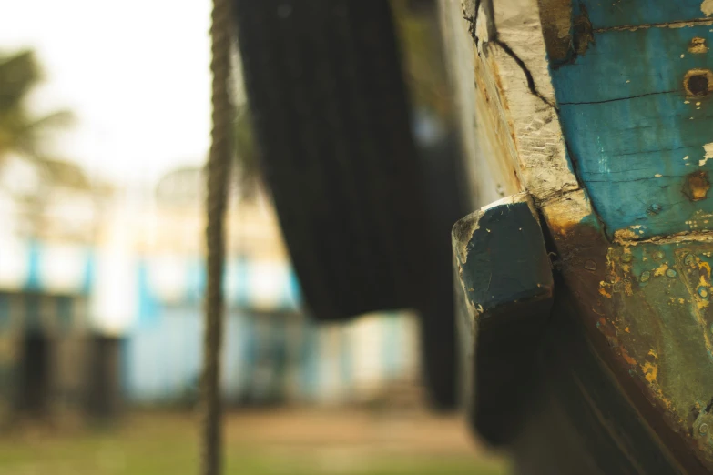 a close up s of a part of a boat with some rust