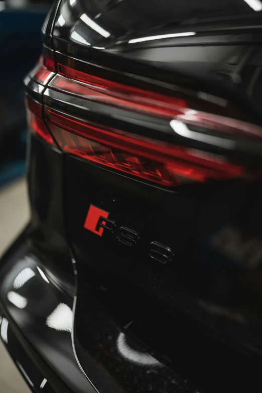 the taillights on the black mercedes c - class