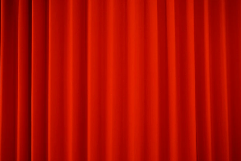 red curtain with the top edge partially visible