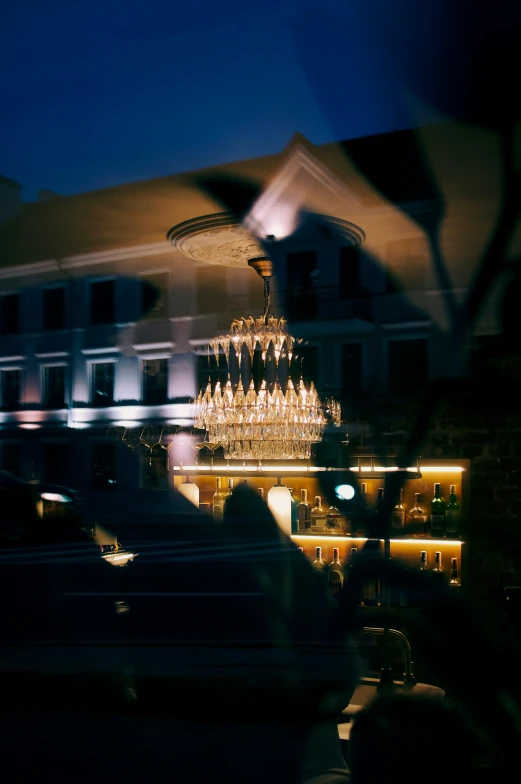 a large crystal chandelier in front of a building