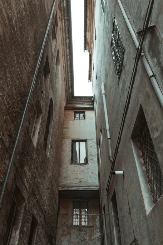 an image of looking up at two buildings