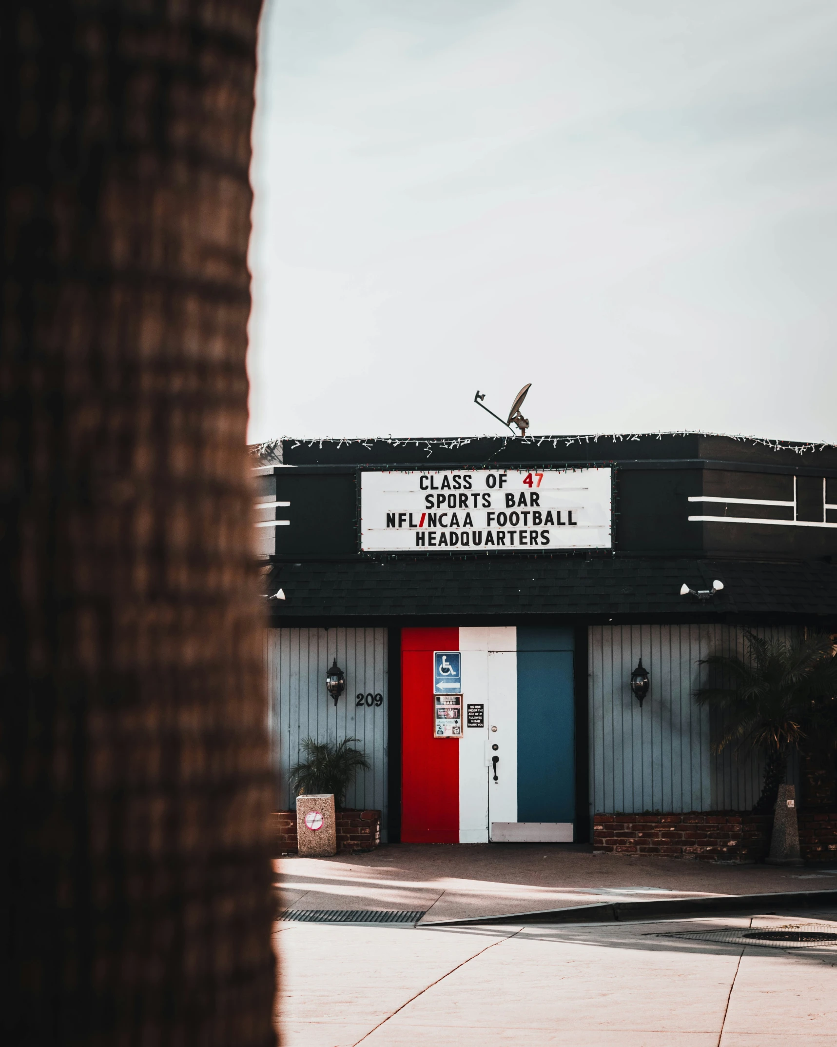 a building that has a sign on the front and side