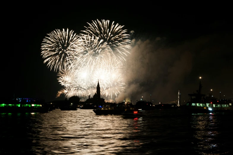 a fireworks show lit up the night sky with lights