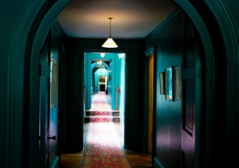 an archway is opening up to the hallway