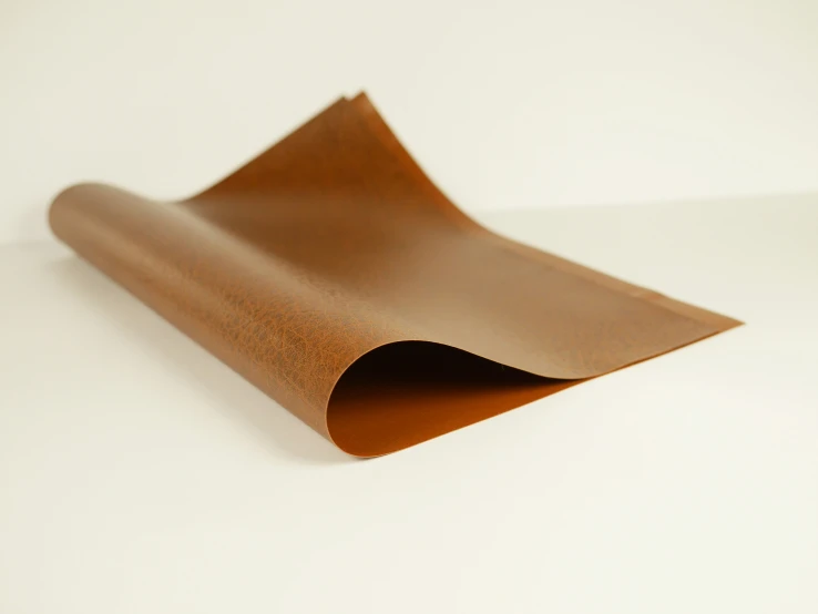 a plain brown paper on a white table