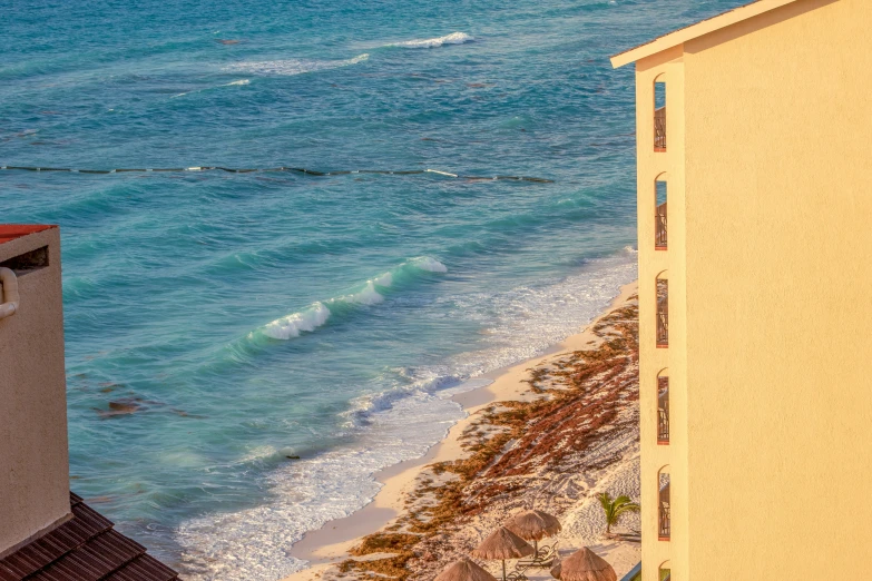 a view of the beach from a high angle building