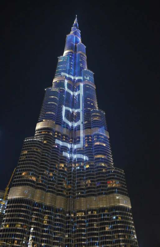 the lit building is reflecting light on the side