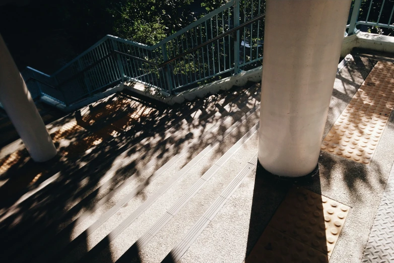 an image of sunlight from above some stairs