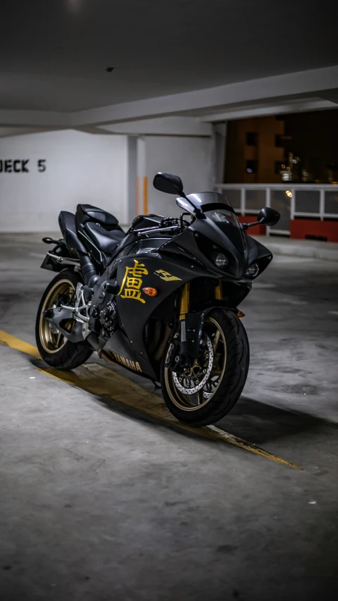 a motorcycle parked inside of a parking garage