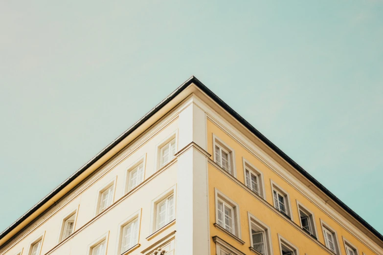 a very tall building that is under the clear sky