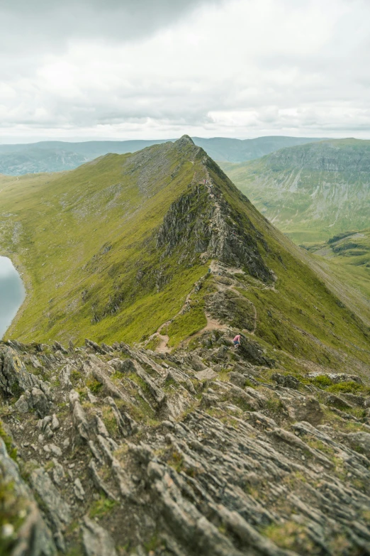 an aerial view of mountains in the distance