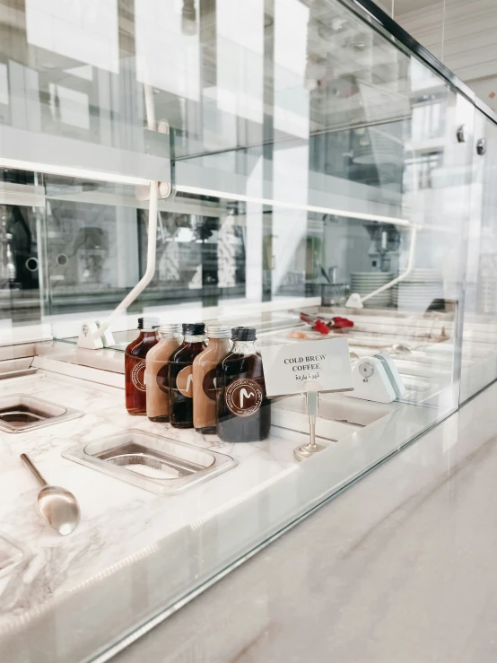 a counter with various items in a display case