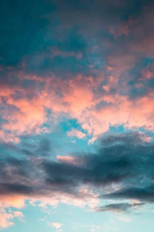 the sky is covered in purple and blue