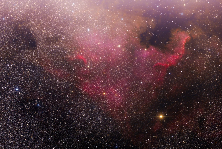 a heart - shaped cloud in the center of the space