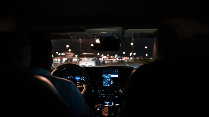 a po taken from inside of a car looking out at traffic