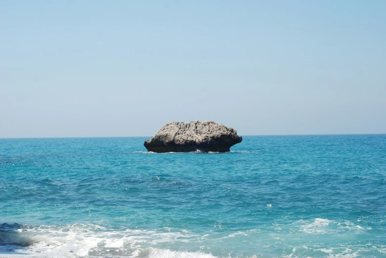 there is a rock out on the ocean