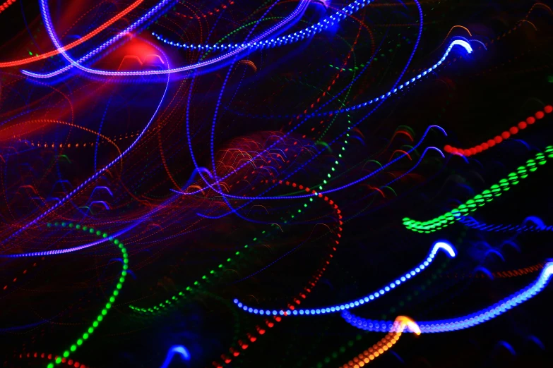 colored lines are glowing brightly over a black background