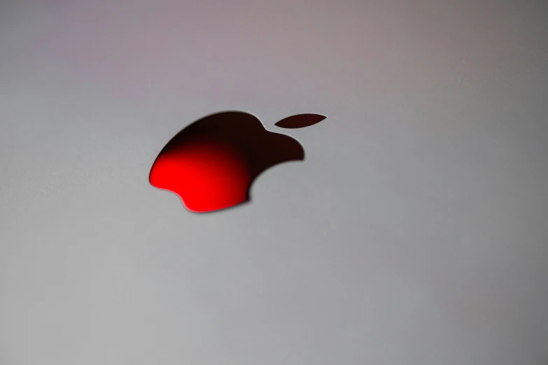 an apple logo on the side of a computer