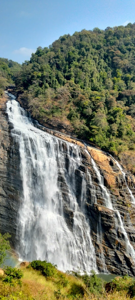 the waterfall is right above the water