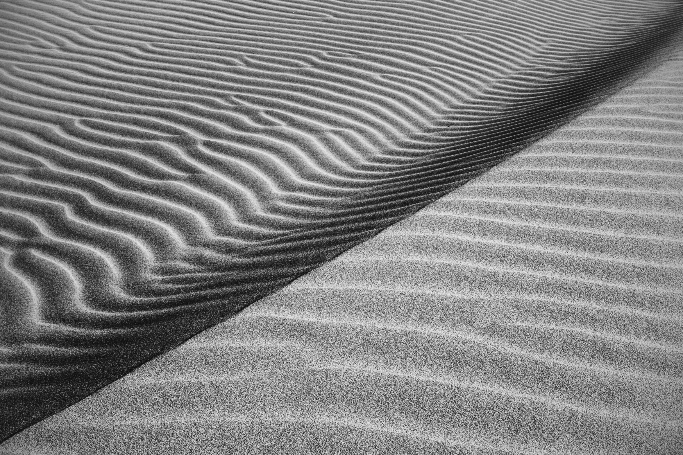 a sand dune has wavy, irregular lines