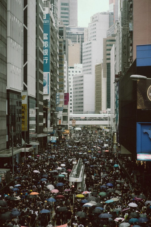 a crowd of people standing next to each other