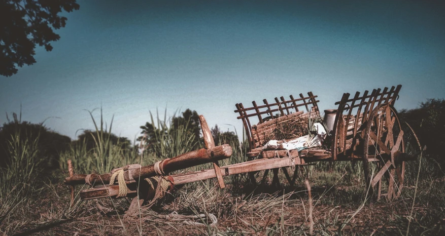 an old farm implements out in the field