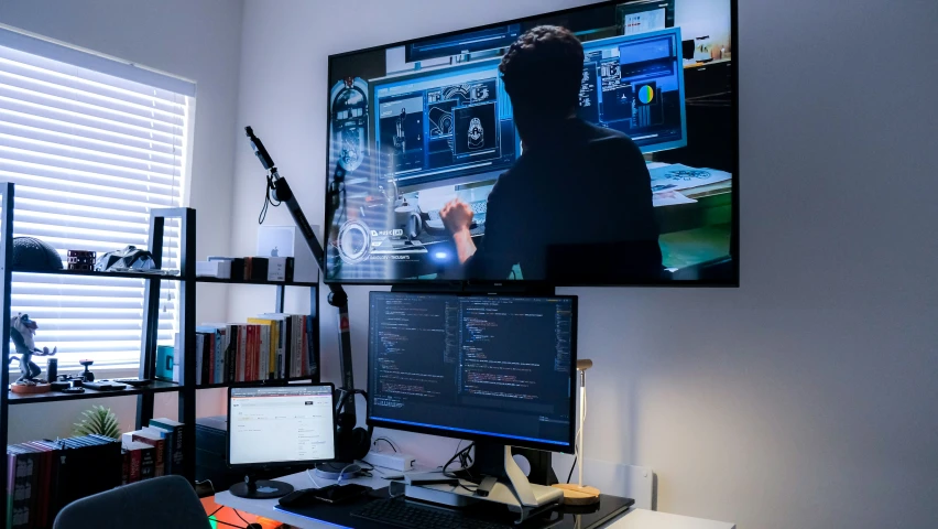 there is a computer on the desk and in front of the monitor