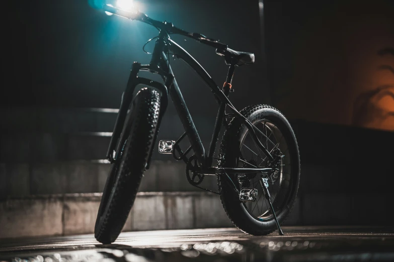 this is an image of a bicycle at night