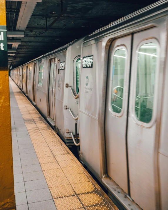 train doors are open in this po of a platform