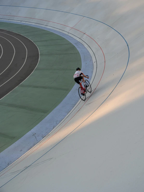 a person is riding a bike on the road