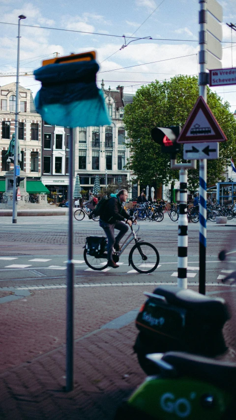 this man is riding his bike down the street