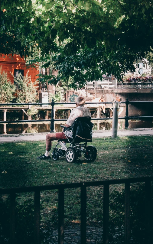 a woman riding on top of a motorized bike