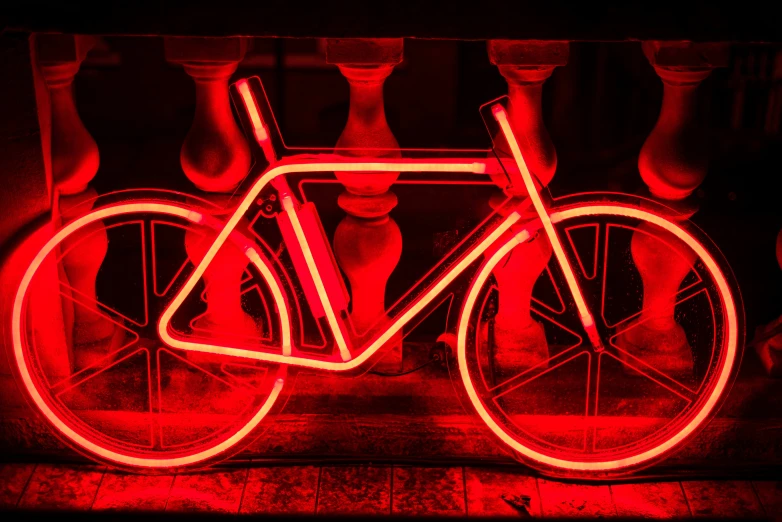 a bicycle lit up with red and blue lights