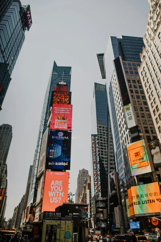 a city filled with tall buildings surrounded by traffic