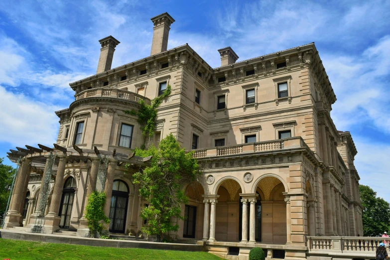 the large stone mansion is full of stone columns