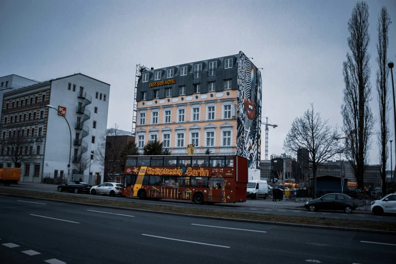 the bus is traveling down the city street