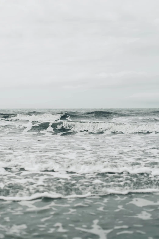 a surfer surfing on the ocean waves