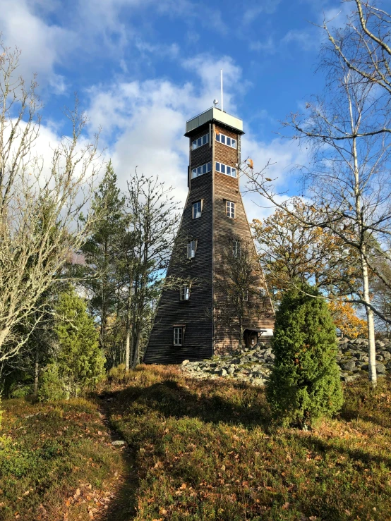 this is a very tall wooden structure with a tower