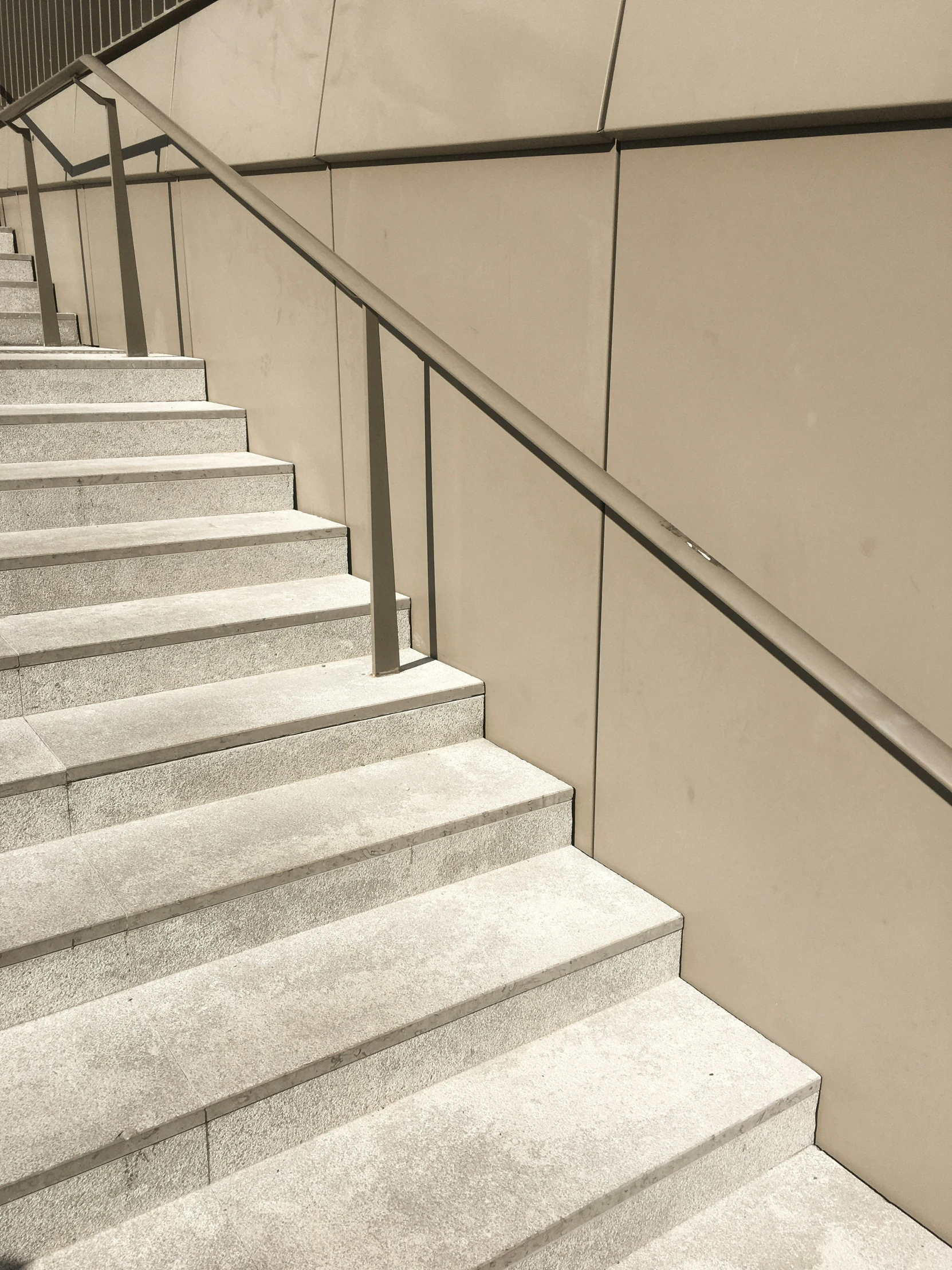 white stairs outside a building on a sunny day