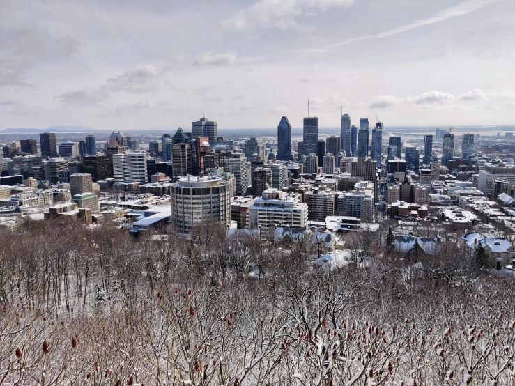 an overview of a cityscape covered in snow