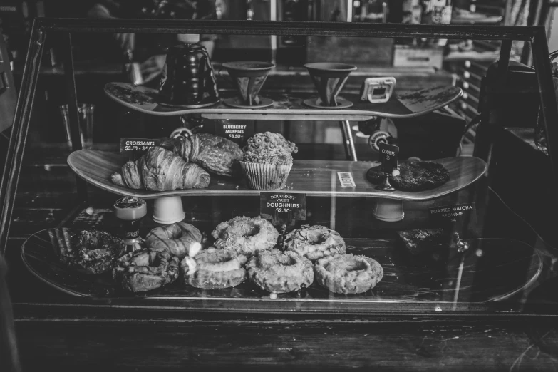 a display case filled with lots of donuts