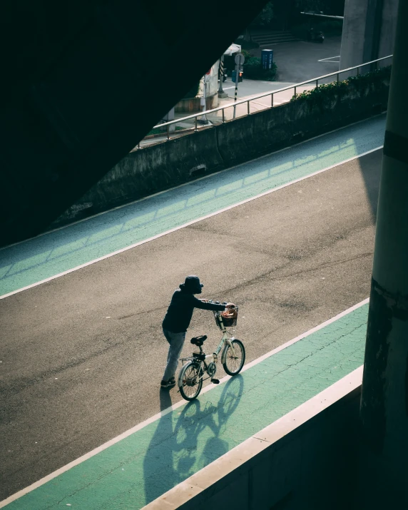 a person on a bike in a tunnel