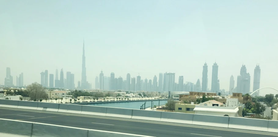 some big city buildings with a big blue water