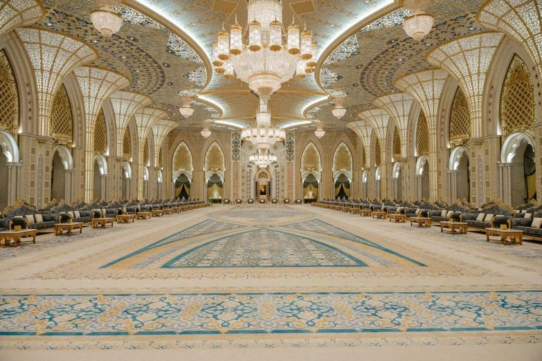 an ornately decorated hall filled with furniture