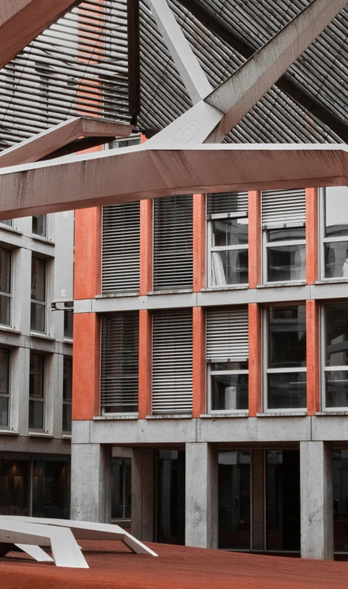 the inside of a building with a person standing outside