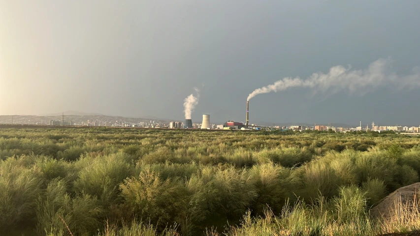 smoke coming out of the stacks and pipes of air pollution